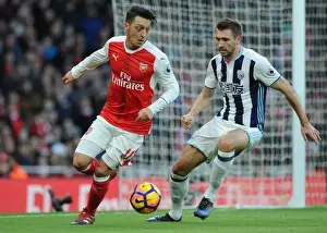 Arsenal V West Bromwich Albion 2016-17 Prints: Mesut Ozil vs Craig Dawson: A Battle at the Emirates - Arsenal vs West Bromwich Albion