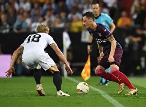 Valencia CF V Arsenal 2018-19 Prints: Mesut Ozil vs. Daniel Wass: Arsenal's Europa League Semi-Final Battle at Valencia