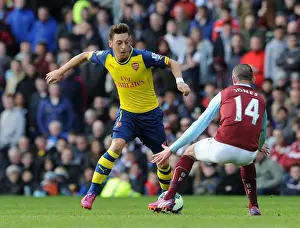 Burnley V Arsenal 2014/15 Prints: Mesut Ozil vs. David Jones: A Premier League Showdown at Turf Moor (2015)