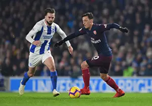 Brighton And Hove Albion V Arsenal 2018-19 Prints: Mesut Ozil vs. Davy Propper: Battle in the Midfield - Arsenal vs