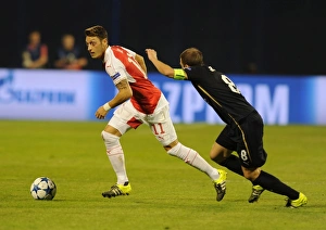 Dinamo Zagreb V Arsenal 2015-16 Prints: Mesut Ozil vs. Domagoj Antolic: A Battle in Arsenal's Champions League Clash with Dinamo Zagreb (September 2015)
