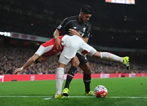 Arsenal V Liverpool 2015/16 Prints: Mesut Ozil vs. Emre Can: A Midfield Duel at the Emirates - Arsenal vs. Liverpool (2015/16)