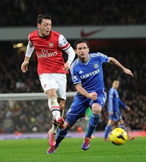 Images Dated 23rd December 2013: Mesut Ozil vs. Frank Lampard: Battle at the Emirates - Arsenal v Chelsea (2013-14)