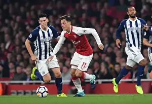 Arsenal V West Bromwich Albion 2017-18 Prints: Mesut Ozil vs. Gareth Barry: Clash at the Emirates - Arsenal v West Bromwich Albion