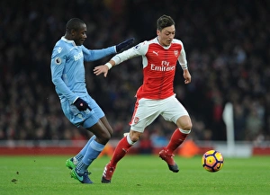 Arsenal V Stoke City 2016-17 Prints: Mesut Ozil vs. Giannelli Imbula: Arsenal vs. Stoke City, Premier League Showdown