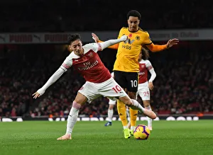Arsenal V Wolverhampton Wanderers 2018-19 Prints: Mesut Ozil vs. Helder Costa: A Battle at the Emirates
