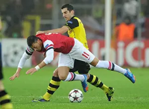 Borussia Dortmund V Arsenal 2013-14 Prints: Mesut Ozil vs. Henrikh Mkhitaryan: Battle at Signal Iduna Park - Borussia Dortmund vs