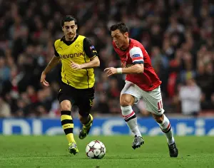 Arsenal V Borussia Dortmund 2013-14 Prints: Mesut Ozil vs. Henrikh Mkhitaryan: Clash of the Playmakers - Arsenal v Borussia Dortmund
