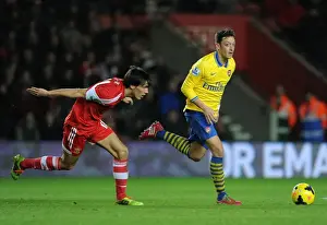 Southampton V Arsenal 2013-14 Prints: Mesut Ozil vs Jack Cork: Battle in the Midfield - Southampton vs Arsenal