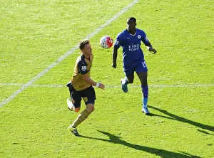 Mesut Ozil vs. Jeffrey Schlupp: A Football Battle at Leicester City vs. Arsenal