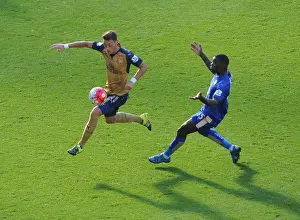 Leicester City V Arsenal 2015/16 Prints: Mesut Ozil vs Jeffrey Schlupp: A Premier League Battle
