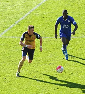 Leicester City V Arsenal 2015/16 Prints: Mesut Ozil vs Jeffrey Schlupp: A Premier League Showdown