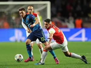 Monaco V Arsenal 2014/15 Prints: Mesut Ozil vs. Jeremy Toulalan: Battle for Ball Possession in Monaco vs