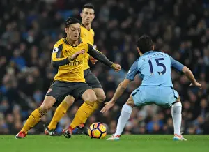 Manchester City V Arsenal 2016-17 Prints: Mesut Ozil vs Jesus Navas: Clash of the Stars in Manchester City vs Arsenal