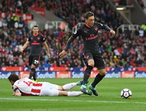 Stoke City V Arsenal 2017-18 Prints: Mesut Ozil vs Joe Allen: Clash of Midfield Titans - Stoke City vs Arsenal