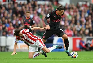 Mesut Ozil vs Joe Allen: A Premier League Battle at Stoke City