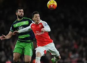 Mesut Ozil vs Jordi Amat: Intense Battle at the Emirates during Arsenal vs Swansea Clash (2015-16)