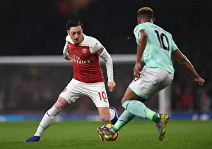 Arsenal V Bournemouth 2018-19 Prints: Mesut Ozil vs Jordon Ibe: Battle at Emirates Stadium - Arsenal vs Bournemouth