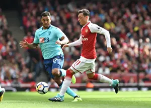 Arsenal V AFC Bournemouth 2017-18 Prints: Mesut Ozil vs. Josh King: Intense Battle at the Emirates Stadium - Arsenal vs