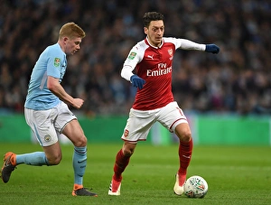 Arsenal V Manchester City - Carabao Cup Final 2018 Prints: Mesut Ozil vs. Kevin De Bruyne: Clash of the Creatives - Arsenal v Manchester City Carabao Cup Final