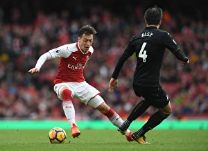 Arsenal V Swansea City 2017-18 Prints: Mesut Ozil vs. Ki Sung-Yeung: Arsenal vs. Swansea City, Premier League Showdown