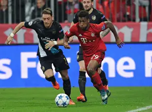 Bayern Munich V Arsenal 2015-16 Prints: Mesut Ozil vs. Kingsley Coman: A Champions League Showdown