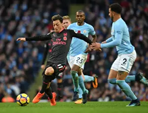 Manchester City V Arsenal 2017-18 Prints: Mesut Ozil vs. Kyle Walker: Clash of the Stars in Manchester City vs. Arsenal (2017-18)