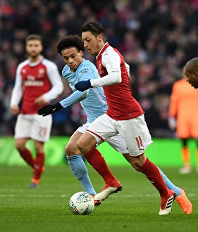 Arsenal V Manchester City - Carabao Cup Final 2018 Prints: Mesut Ozil vs. Leroy Sane: Clash of the Creatives - Arsenal v Manchester City Carabao Cup Final