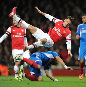 Arsenal V Hull City 2013-14 Prints: Mesut Ozil vs. Liam Rosenior: Intense Battle at Arsenal v Hull City (2013-14)