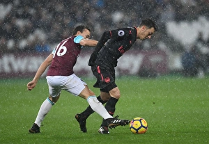West Ham United V Arsenal 2017-18 Prints: Mesut Ozil vs Mark Noble: A Premier League Showdown