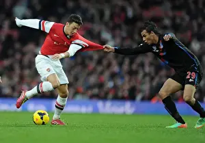 Arsenal V Crystal Palace 2013-14 Prints: Mesut Ozil vs Marouane Chamakh: Intense Battle at Arsenal vs Crystal Palace