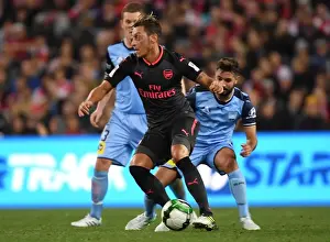 Sydney FC V Arsenal - 2017-18 Prints: Mesut Ozil vs Michael Zullo: A Pre-Season Battle at ANZ Stadium