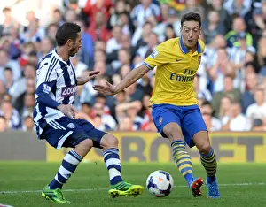 West Bromwich Albion V Arsenal 2013-14 Prints: Mesut Ozil vs. Morgan Amalfitano: A Battle in the Premier League - West Bromwich Albion vs