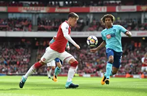 Arsenal V AFC Bournemouth 2017-18 Prints: Mesut Ozil vs. Nathan Ake: A Tactical Duel at Emirates Stadium - Arsenal vs