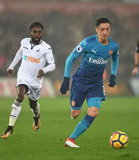 Swansea City V Arsenal 2017-18 Prints: Mesut Ozil vs. Nathan Dyer: Clash at Swansea's Liberty Stadium (Swansea City v Arsenal 2017-18)