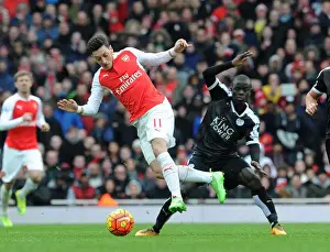 Arsenal V Leicester City 2015-16 Prints: Mesut Ozil vs N'Golo Kante: A Premier League Showdown at Arsenal vs Leicester City