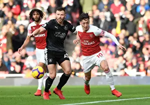 Arsenal V Burnley 2018-19 Prints: Mesut Ozil vs. Phil Bardsley: Battle for Ball Possession - Arsenal vs