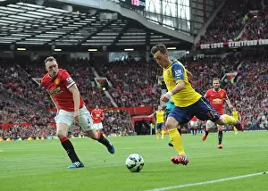 Manchester United V Arsenal 2014-15 Prints: Mesut Ozil vs. Phil Jones: A Premier League Showdown at Old Trafford (Arsenal vs)