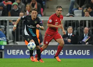 Bayern Munich V Arsenal 2015-16 Prints: Mesut Ozil vs. Philipp Lahm: A Champions League Showdown