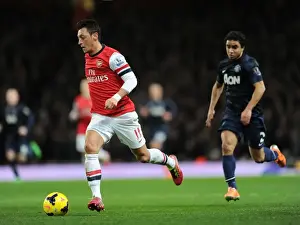 Arsenal V Manchester United 2013-14 Prints: Mesut Ozil vs Rafael: Intense Battle at Arsenal vs Manchester United (2013-14)