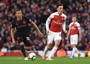 Arsenal V Everton 2018-19 Prints: Mesut Ozil vs Richarlison: Intense Battle at Arsenal's Emirates Stadium (Arsenal v Everton 2018-19)