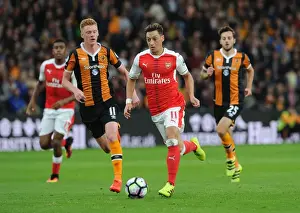 Hull City V Arsenal 2016-17 Prints: Mesut Ozil vs Sam Clucas: A Premier League Showdown at KCOM Stadium