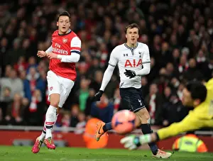 Arsenal V Tottenham Hotspur 2013-14 Prints: Mesut Ozil vs Vlad Chiriches: Intense Shootout at Arsenal v Tottenham FA Cup Match