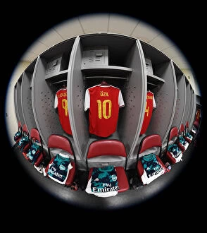 Images Dated 15th July 2019: Mesut Ozil's Abandoned Arsenal Jersey in Arsenal Changing Room