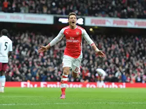 Arsenal V Aston Villa 2014-15 Prints: Mesut Ozil's Decisive Goal: Arsenal's Victory over Aston Villa