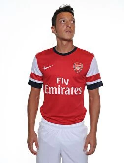 Images Dated 4th September 2013: Mesut Ozil's First Arsenal Photoshoot: New Signing Unveiled in Munich