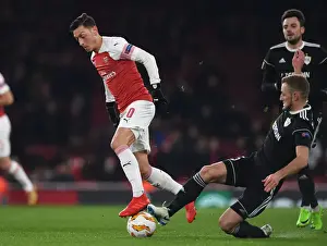 Arsenal V Qarabag 2018-19 Prints: Mesut Ozil's Gorgeous Backheel: A Memorable Moment from Arsenal's Europa League Triumph over Qarabag