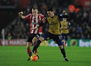 Images Dated 26th December 2015: Mesut Ozil's Masterclass: Outsmarting James Ward-Prowse at Southampton, Premier League 2015-16