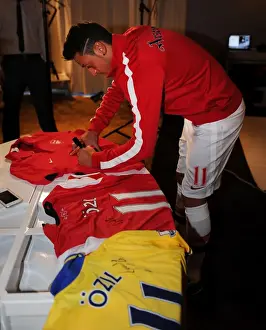 Mesut Ozil's Munich Debut: Arsenal's New Signing at Photo Shoot