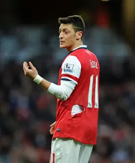 Arsenal V Crystal Palace 2013-14 Prints: Mesut Ozil's Ripped Shirt: Intense Moment from Arsenal vs